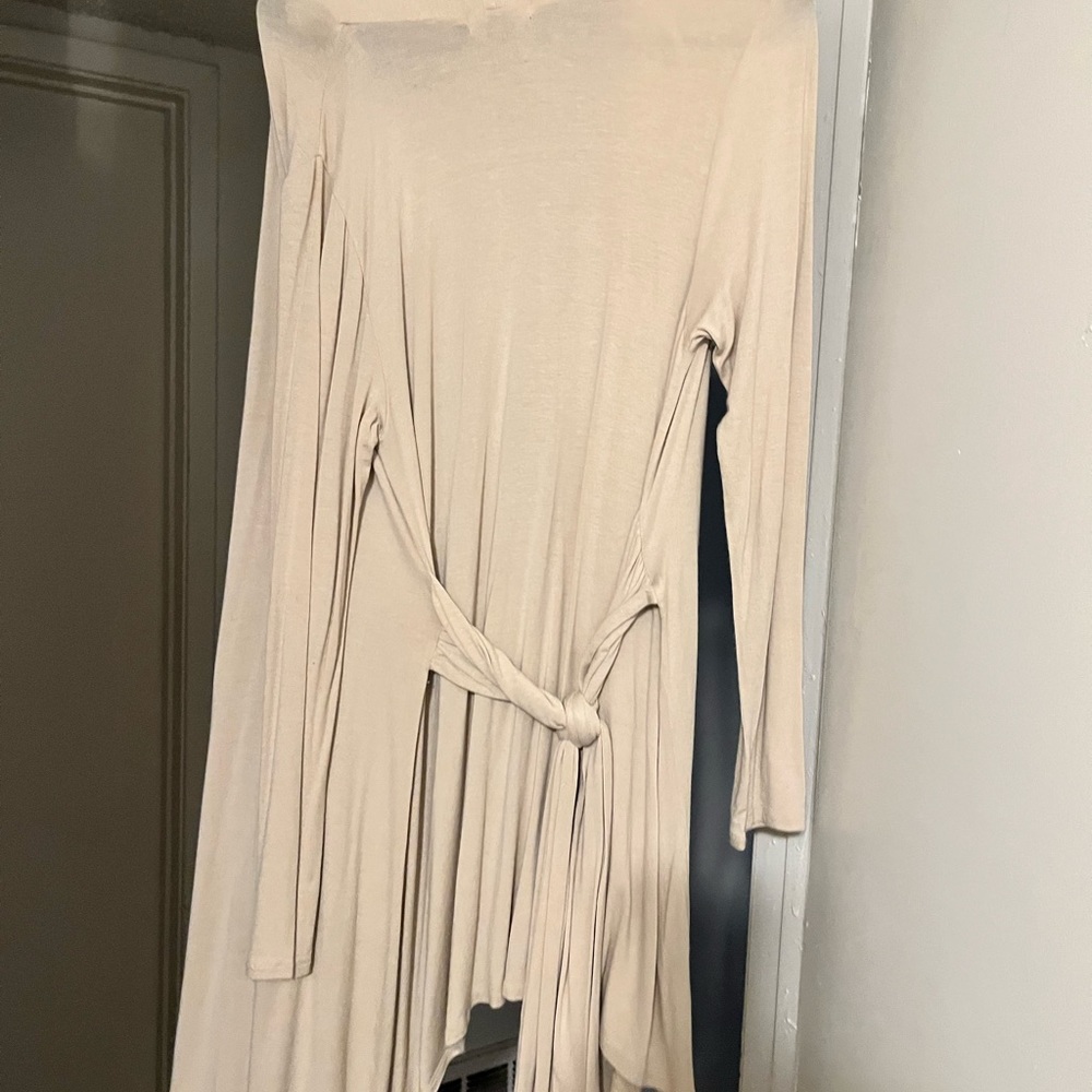 Size medium cover up. Very comfortable and light weight
